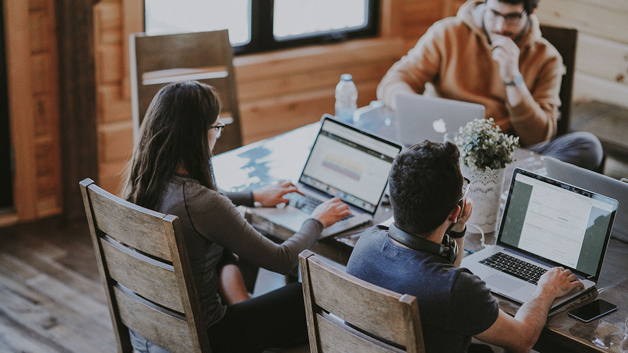 People who are a part of a remote team in a co-working space